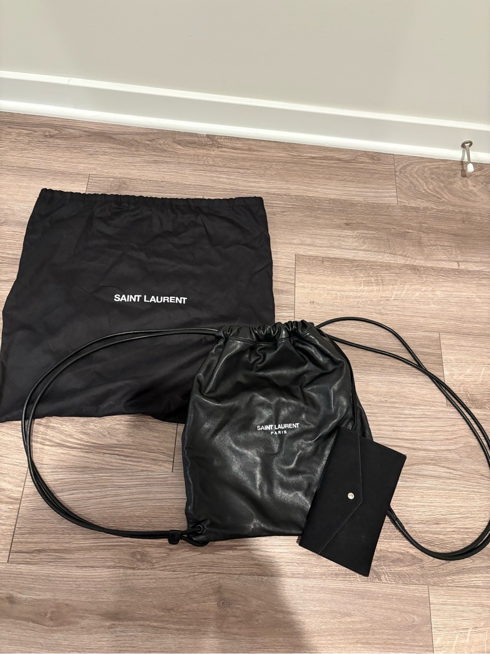Saint Laurent Black Leather Drawstring Pouch Backpack with Card Holder